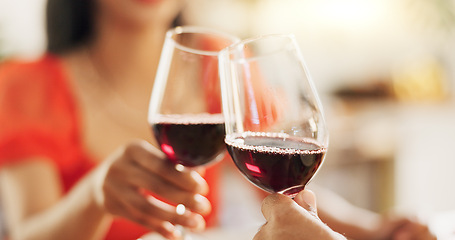 Image showing Couple, hands and toast with red wine for celebration of love, romance and valentines day on their anniversary. People or lover on date with glasses, drinks and alcohol for cheers, success and luxury