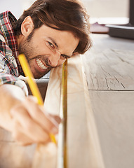 Image showing Man, wood and carpenter with craft, diy and frustration for building, work and repair. Contractor, handyman and artisan with home improvement, maintenance and work for woodwork, struggle and skill