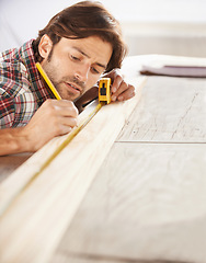 Image showing Man, carpenter and wood with thinking, building and working for renovation, remodeling and repair. Craftsman, diy and woodwork for home improvement, design and ideas with artisan, craft and skill