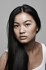 Image showing Woman, portrait and cosmetic beauty in studio for make up confidence for Japanese, mockup space or white background. Asian person, model and wellness self care for dermatology, skincare or treatment