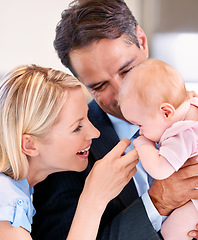 Image showing Couple, love and closeup with home, baby and smile for happy, child and mother. Parents, daughter and kitchen with house kids and father for bonding, family and children with touch and holding