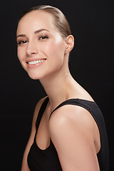 Image showing Studio, portrait and skincare of woman with confidence, cosmetic and facial treatment on black background. Model, smile or make up for spa cosmetology for glow face, beauty or collagen for soft skin