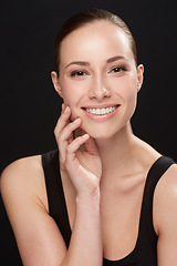 Image showing Studio, portrait and cosmetics of woman with happiness, cosmetic and facial treatment on black background. Model, smile and make up for spa beauty for glow body, skincare and collagen for soft skin