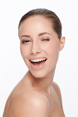 Image showing Portrait, smile and woman wink for skincare, flirt or natural beauty isolated on white studio background. Face, blink and happy model in cosmetics excited for spa facial treatment for healthy skin