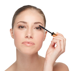 Image showing Woman, face and skincare for beauty, mascara and makeup with lashes and cosmetology on white background. Portrait, wand for eyelash extension and skin, glow or shine with cosmetics product in studio