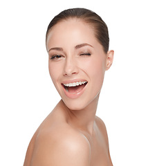 Image showing Portrait, happy and woman wink for skincare, flirt or beauty isolated on white studio background. Face, blink and smile of model in makeup cosmetics excited for spa facial treatment for healthy skin