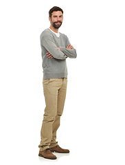 Image showing Happy, man and portrait with arms crossed in studio with casual fashion, confidence and mock up space. Person, model and face with smile, pride and calm expression for edgy outfit on white background