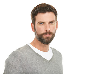 Image showing Serious, portrait and man in studio with casual clothes for fashion in V neck pullover top, beard and headshot. Face of a young model or person from the USA with relaxed style on a white background