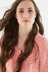 Image showing Woman, fashion and serious in studio portrait with confidence, pride or trendy with style by white background. Isolated girl, person or model with edgy clothes, face and red sweater in Argentina