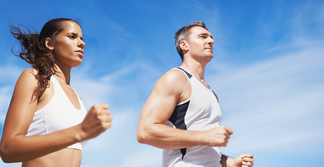 Image showing Running, beach and couple with fitness, summer and weekend break with cardio and training for wellness. Runners, seaside and man with woman and support with practice and activity for health and hobby