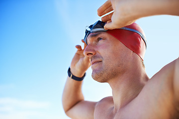 Image showing Beach, goggles and man with holiday, cap and swimmer with adventure and summer break with getaway trip. Person, athlete and player with protection and seaside with sunshine and fitness with wellness