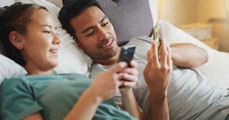 Image showing Phone, couple and video mobile streaming of people in bed looking at social media app content. Internet, technology and bedroom web scroll of a girlfriend and boyfriend at home look at a funny meme