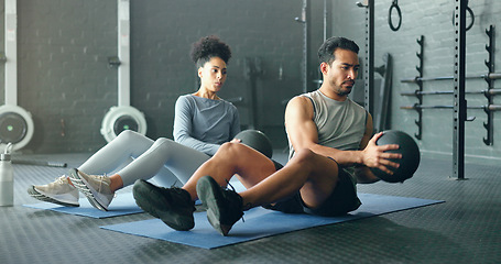 Image showing Fitness, energy and friends on gym floor with weight ball for training, power and exercise together. Cross, workout and black woman with man for sports, power and cardio in strength, core and mindset