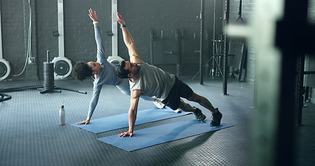 Image showing Couple, fitness and exercise in gym for healthy, wellness and support with motivation training and healthy lifestyle. Personal trainer and woman client workout, cardio and movement in health club