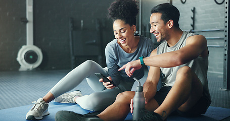 Image showing Smartphone, fitness and personal trainer talking to client for exercise goal planning on mobile app, internet search or health software. Young sports people on floor in conversation and using phone