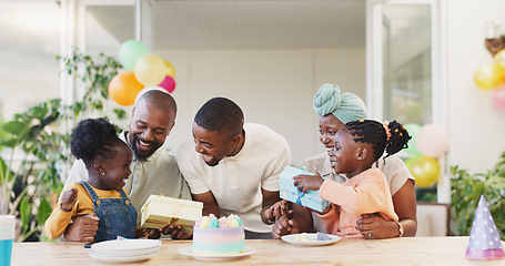 Image showing Birthday, present and black family celebrate with children with love, care and surprise. African woman, men and happy kids together at home for a gift, quality time and fun at a party with cake