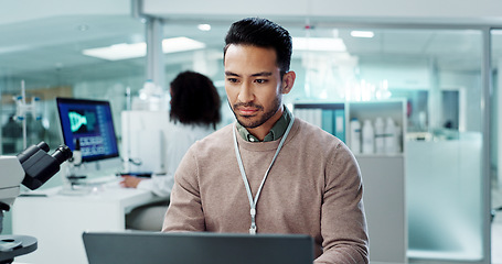 Image showing Man, laptop and lab for futuristic medicine or science or online internet for research, microscope or study. Male person, innovation and biotechnology project for investigation, cure or development