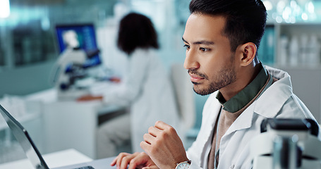 Image showing Laptop, typing or scientist with research in laboratory for a chemistry report or medical test feedback. Internet, person reading or science update for online medicine development news on website