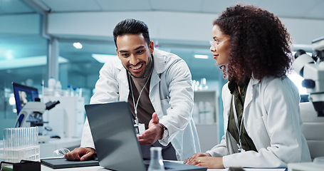 Image showing Scientist, teamwork and happy with laptop in laboratory for test breakthrough, pharmaceutical review or success. Science, collaboration or technology for research, discussion and digital analysis