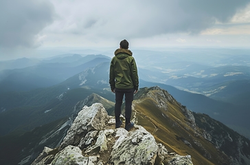 Image showing Person Standing on Top of Mountain, Majestic View of the World From the Summit