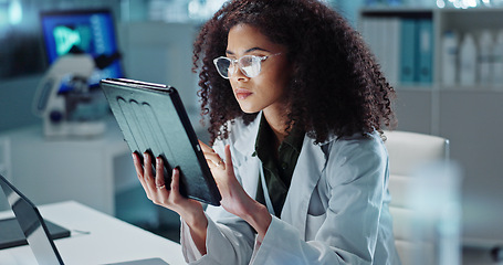 Image showing Tablet, reading and woman scientist in laboratory working on medical research, project or experiment. Science, career and female researcher with digital technology for pharmaceutical innovation.