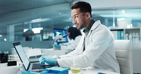 Image showing Laptop, typing or scientist with research in laboratory for a chemistry report or medical test feedback. Internet, person reading or science update for online medicine development news on website