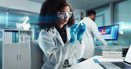 Image showing Woman, scientist or blood vial for testing in laboratory, healthcare or pathology to label on test tube. Biotechnology, pharmaceutical and laptop by doctor and online scientific results in phlebotomy