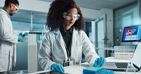 Image showing Woman, scientist or blood vial for exam in laboratory, healthcare or pathology to label on test tube. Biotechnology, pharmaceutical and laptop by doctor and online scientific results in phlebotomy