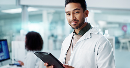 Image showing Man, face and scientist with tablet in laboratory and online research of genetics specialist in healthcare. Asian doctor, portrait and happy at work in pharmaceutical career and working on innovation