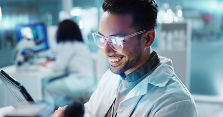 Image showing Tablet, Asian man or scientist with research in laboratory for a chemistry report or medical test feedback. Happy, person reading or science update for online medicine development news on website