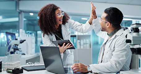 Image showing Science, teamwork and high five with laptop in laboratory for test breakthrough, pharmaceutical review or excited. Scientist, collaboration or mentor for research success, talking or digital analysis