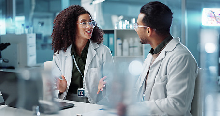 Image showing Science, teamwork and scientist with laptop in laboratory for communication, pharmaceutical review or planning. Employees, collaboration and technology for research, discussion and digital analysis