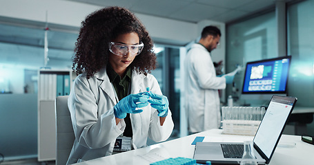 Image showing Woman, scientist or blood vial for exam in laboratory, healthcare or pathology to label on test tube. Biotechnology, pharmaceutical and laptop by doctor and online scientific results in phlebotomy