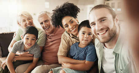 Image showing Selfie, happy and face of a big family in the living room relaxing, bonding and spending time together. Smile, love and portrait of boy children sitting with parents and grandparents at their home.