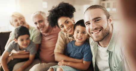 Image showing Selfie, happy and face of a big family in the living room relaxing, bonding and spending time together. Smile, love and portrait of boy children sitting with parents and grandparents at their home.