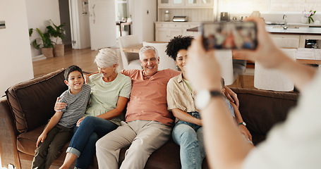 Image showing Phone picture, hands and home happy family, bond and memory photo of weekend reunion, love and time together. Social media app, cellphone or relax grandparents, parents and kids smile for online post
