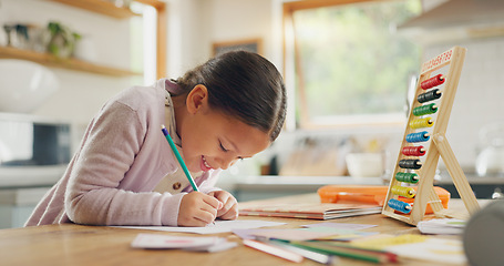 Image showing Learning, writing and happy girl child in a kitchen with maths, homework or counting practice in her home. Education, creative and kid student smile while drawing on table for homeschool art lesson