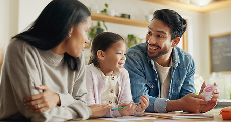 Image showing High five, girl with parents and support with learning in house with card, game or mom and dad helping with homework together in home. Child, family and development of education with math games