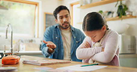 Image showing Angry dad with crying child, homework and scolding in kitchen, helping to study with conflict. Learning, teaching and frustrated father with sad daughter for discipline, education and problem in home