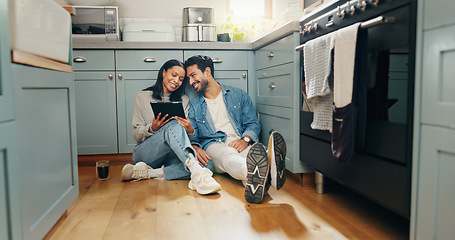 Image showing New home, renovation and couple with digital tablet on a kitchen floor for idea, search or inspiration. Real estate, property and man with woman online for creative, planning and interior design