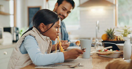 Image showing Father, kids and a girl eating spaghetti with her family in the dining room of their home together for supper. Food, children and parents around a table for a meal, bonding over dinner in a house