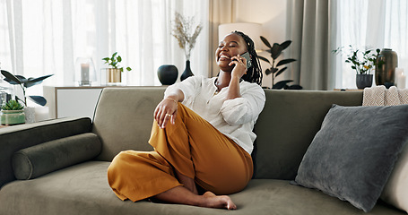 Image showing Funny, phone call and black woman in home, talking or communication on sofa. Smartphone, conversation and African person laughing, listening to story and comedy, chat or news and happy in living room