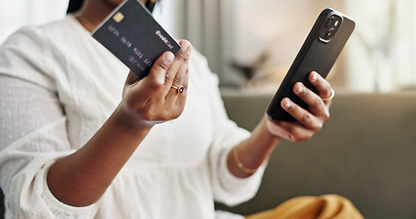 Image showing Woman, credit card and hands with phone for ecommerce payment, online shopping and fintech at home. Closeup, mobile banking and finance for sales, password and code for wealth to upgrade subscription