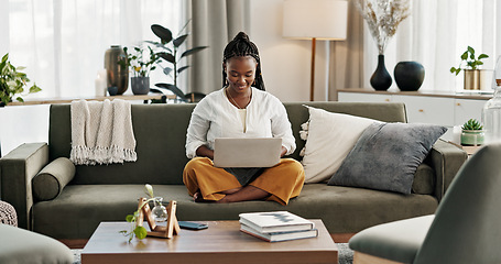 Image showing Black woman on sofa, smile and typing on laptop for remote work, social media or blog post research in home. Happy girl on couch with computer checking email, website or online chat in living room.