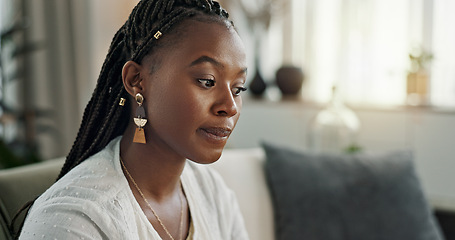 Image showing Stress, doubt and black woman on sofa, thinking and worry with mental health in apartment living room. Frustrated, anxiety and girl sitting on couch with fear, depression and debt trauma in home.