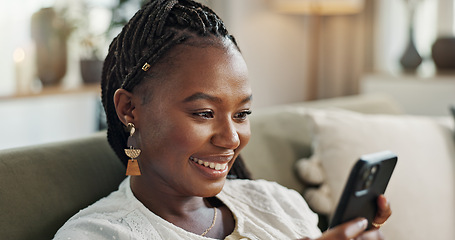 Image showing Home, funny and black woman on a couch, smartphone and connection with social media, comedy post and laugh. African person, apartment or girl on sofa, cellphone or mobile user with humor, joy or joke