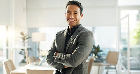 Image showing Crossed arms, happy and business Asian man in office for leadership, empowerment and success. Corporate, manager and portrait of person with funny joke in workplace for ambition, pride and confidence