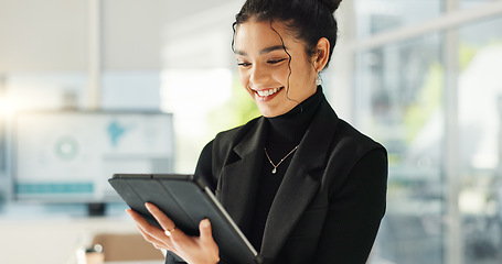 Image showing Happy businesswoman in office with tablet, email or social media for business feedback, schedule or agenda. Smile, digital app and woman networking online for market research, web review and report.