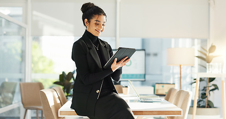 Image showing Happy woman in office with tablet, email or social media review for tech business, schedule or agenda. Smile, digital app and businesswoman networking online for market research, website and report.