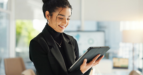 Image showing Happy businesswoman in office with tablet, email or social media for business feedback, schedule or agenda. Smile, digital app and woman networking online for market research, web review and report.